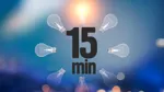 Texten "15 minuter" syns i en cirkel av glödlampor